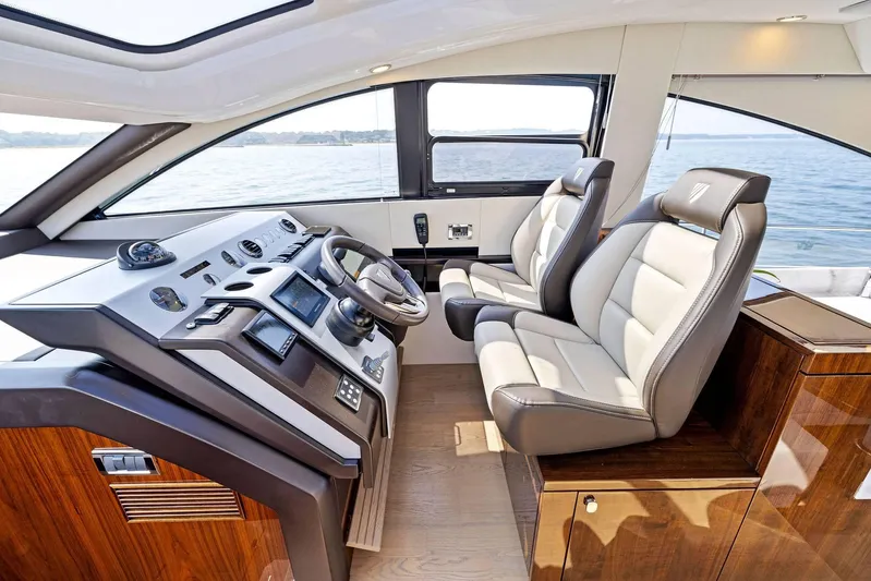 Gt50/251 Yacht Photos Pics 2025 Fairline Targa 50 GT yacht interior with modern helm and luxurious seating.