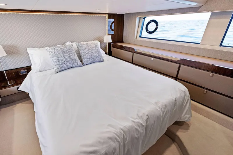 Gt50/251 Yacht Photos Pics Luxurious bedroom interior of 2025 Fairline Targa 50 GT yacht with ocean view.