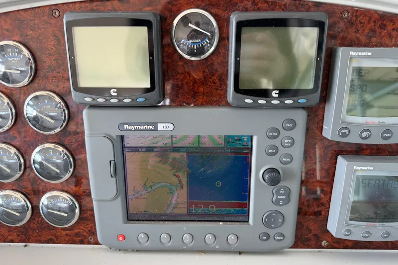  Yacht Photos Pics Dashboard of a 2005 Formula 48 Yacht with Raymarine navigation system and gauges.