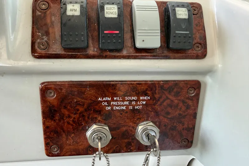  Yacht Photos Pics Control panel of a 2005 Formula 48 Yacht with warning indicators and switches.