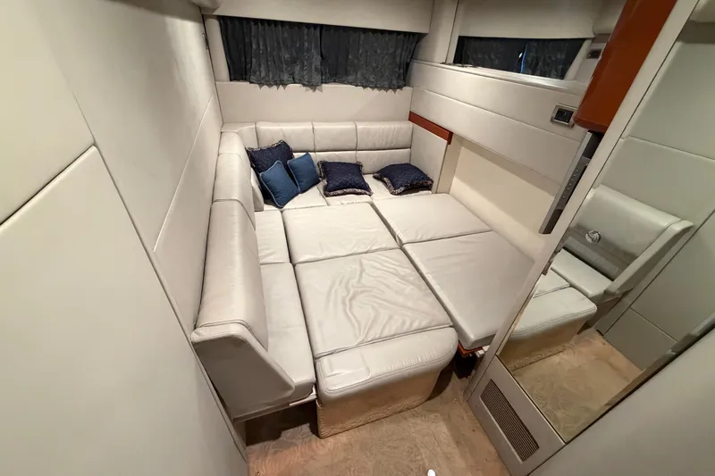  Yacht Photos Pics Luxurious interior of 2005 Formula 48 Yacht with plush seating and decorative pillows.