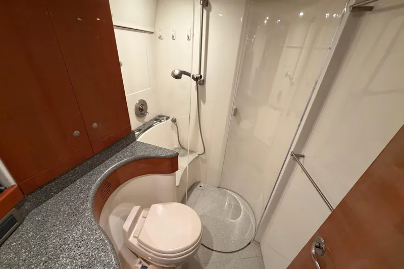  Yacht Photos Pics Luxurious bathroom in 2005 Formula 48 Yacht with modern fixtures and elegant design.