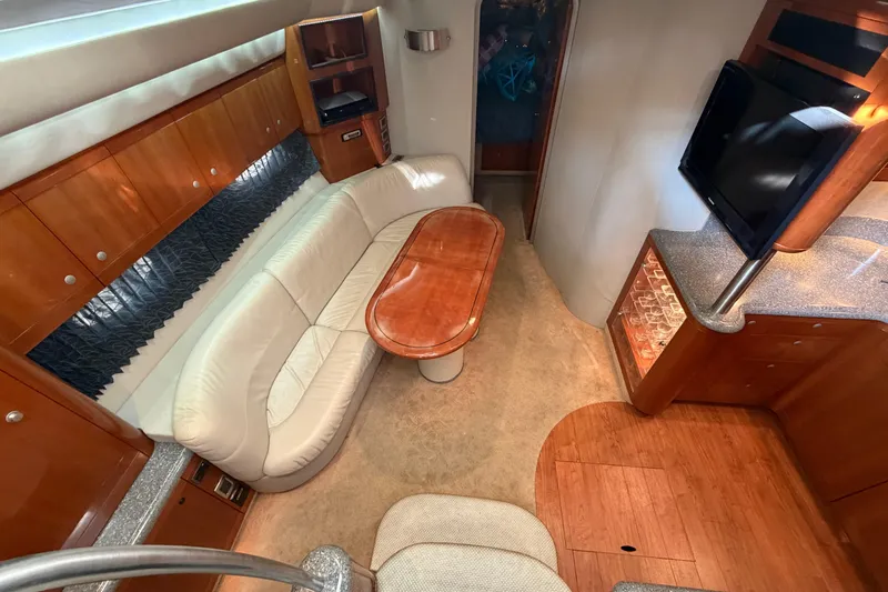  Yacht Photos Pics Luxurious interior of a 2005 Formula 48 Yacht with leather seating and wood finishes.