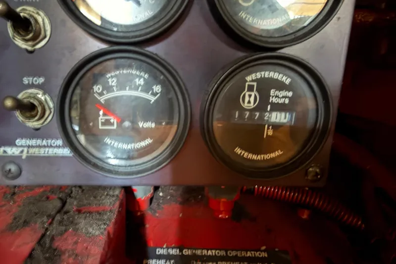  Yacht Photos Pics Close-up of 2005 Formula 48 Yacht engine gauges, showing voltage and engine hours.