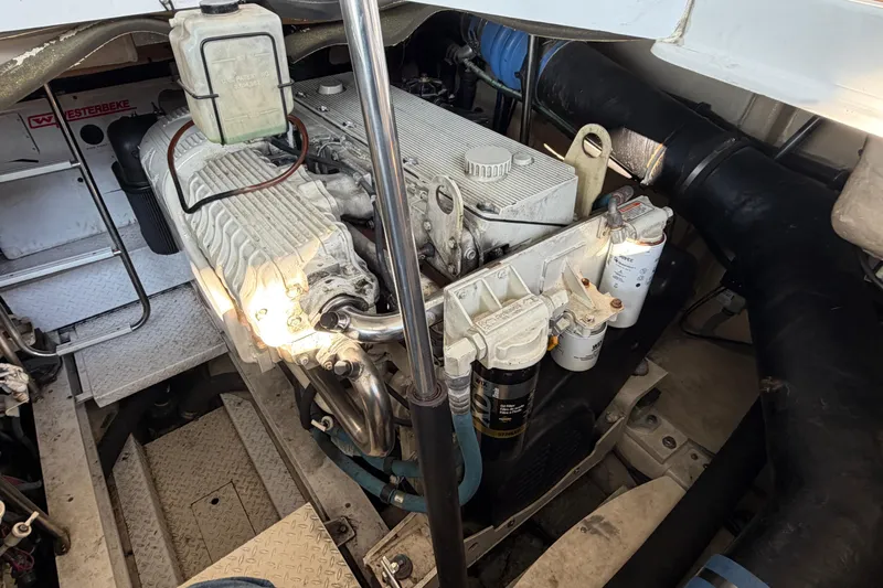  Yacht Photos Pics Engine room of a 2005 Formula 48 Yacht, showcasing mechanical components and filters.