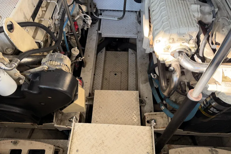  Yacht Photos Pics Engine room of a 2005 Formula 48 Yacht, showcasing mechanical components and layout.