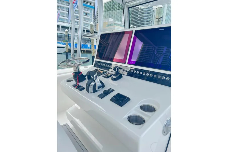  Yacht Photos Pics Helm of 2026 Tideline 365 Offshore boat with dual screens and controls.