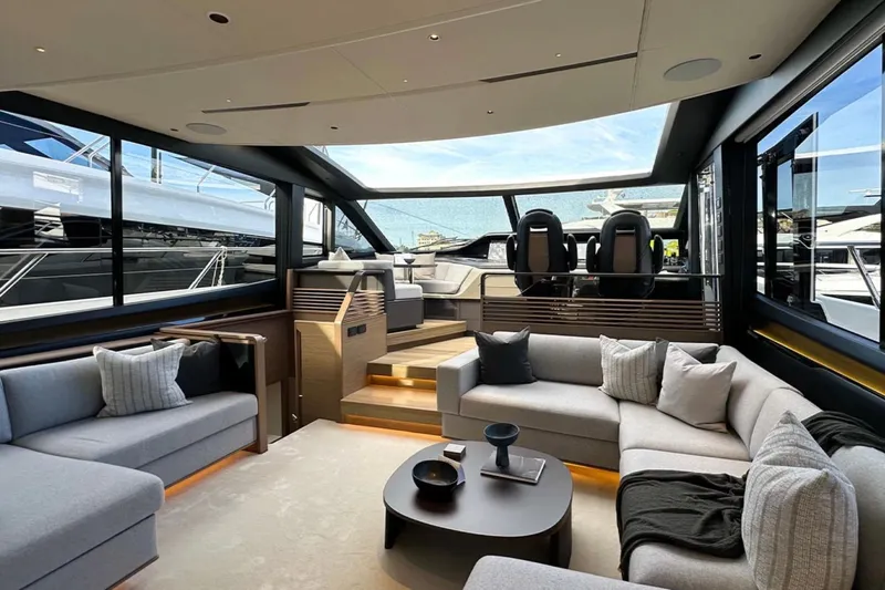  Yacht Photos Pics Luxurious interior of 2025 Princess S80 yacht with modern seating and panoramic windows.