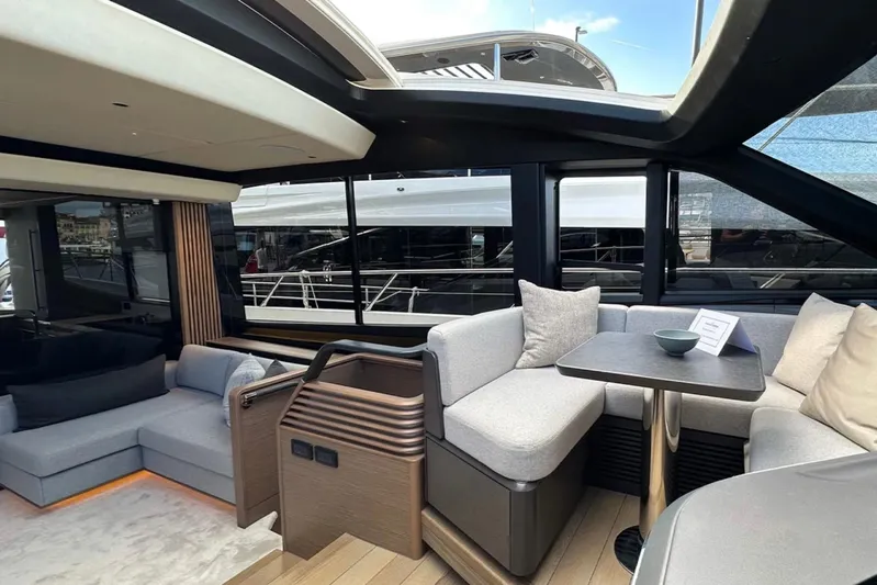  Yacht Photos Pics Luxurious interior of 2025 Princess S80 yacht with modern seating and elegant design.