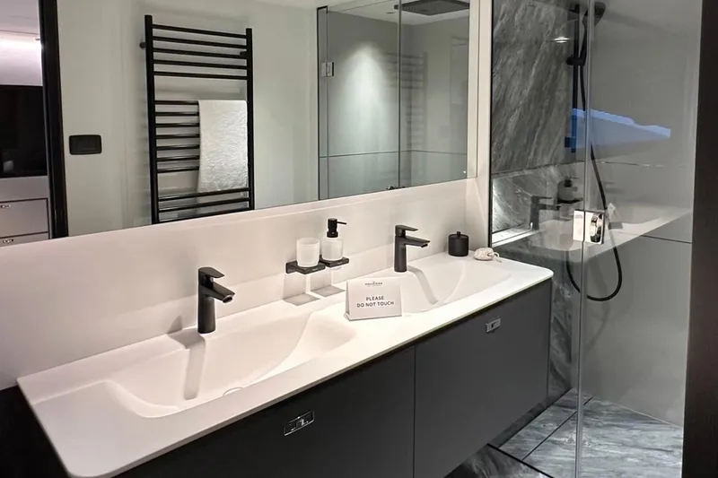  Yacht Photos Pics Modern bathroom in 2025 Princess S80 yacht with dual sinks and sleek design.