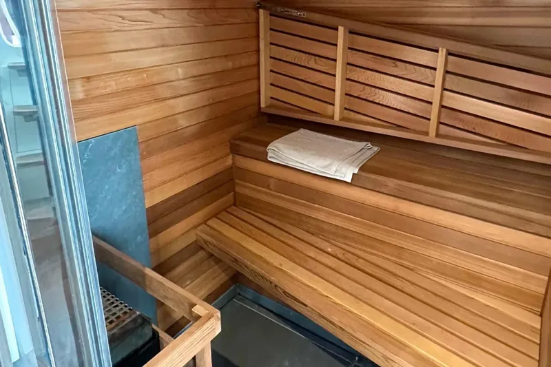  Yacht Photos Pics Luxurious wooden sauna interior on Princess S80 yacht, 2025 model.