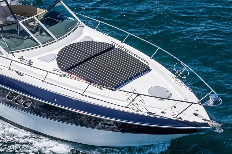 Cruel Summer Yacht Photos Pics 2012 Cruisers 380 Express yacht cruising on blue ocean waters.