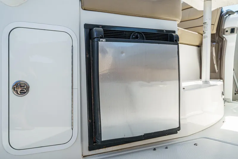 Cruel Summer Yacht Photos Pics 2012 Cruisers 380 Express boat interior with stainless steel mini fridge.