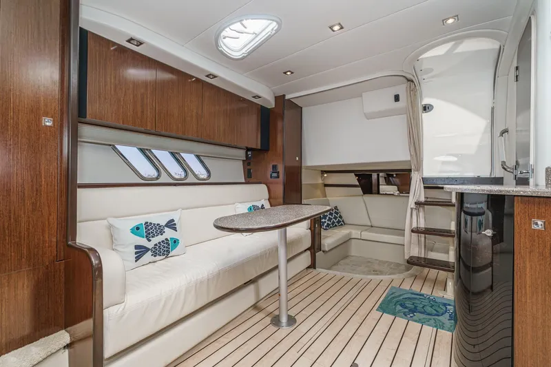 Cruel Summer Yacht Photos Pics Luxurious 2012 Cruisers 380 Express yacht interior with elegant seating and modern design.