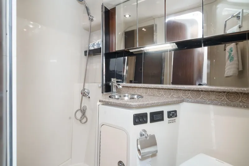 Cruel Summer Yacht Photos Pics Luxurious bathroom in 2012 Cruisers 380 Express yacht with modern fixtures and elegant design.