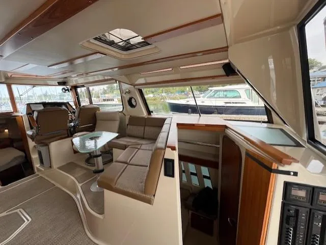 Seahorse Yacht Photos Pics Interior of 2019 Ranger Tugs R-41 CB, featuring seating and helm station.