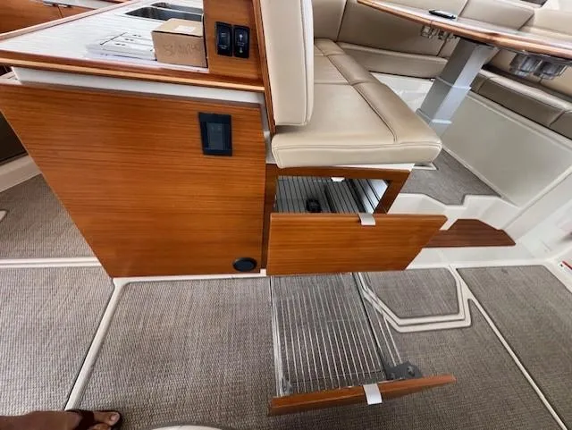 Seahorse Yacht Photos Pics Interior of 2019 Ranger Tugs R-41 CB with open storage drawers and seating.