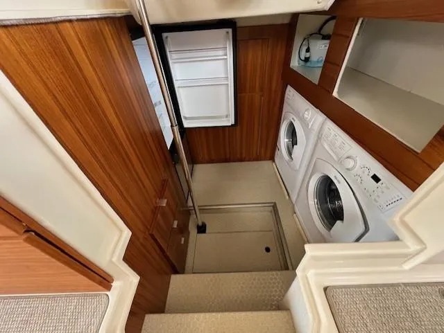 Seahorse Yacht Photos Pics Laundry area inside 2019 Ranger Tugs R-41 CB boat with washer and dryer.