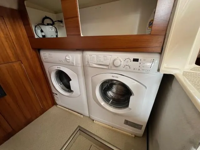 Seahorse Yacht Photos Pics Laundry area with washer and dryer inside 2019 Ranger Tugs R-41 CB boat.