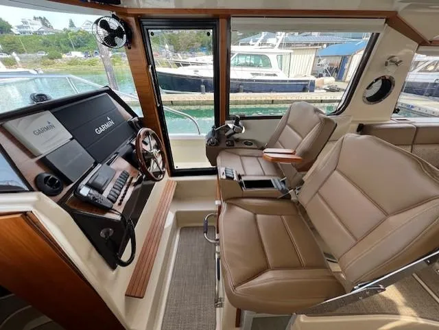 Seahorse Yacht Photos Pics Interior of 2019 Ranger Tugs R-41 CB with leather seats and navigation equipment.