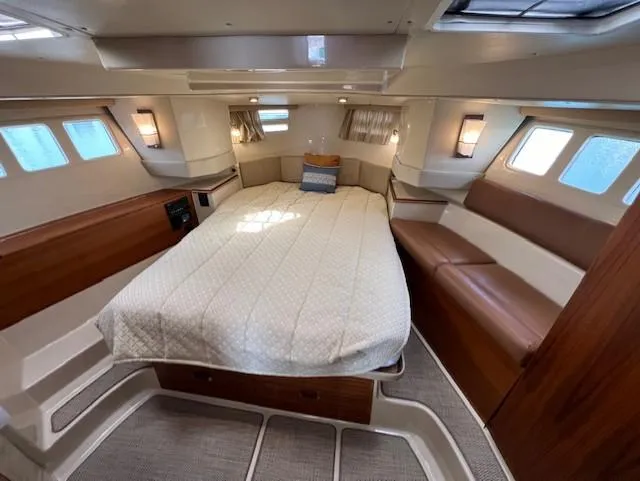 Seahorse Yacht Photos Pics Luxurious cabin interior of 2019 Ranger Tugs R-41 CB with cozy bed and seating.