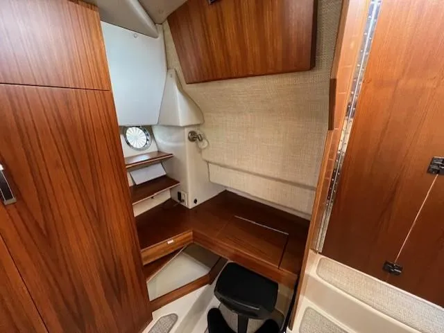 Seahorse Yacht Photos Pics 2019 Ranger Tugs R-41 CB cabin interior with wooden finish and compact design.