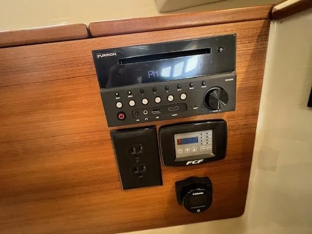 Seahorse Yacht Photos Pics Control panel of 2019 Ranger Tugs R-41 CB with Furrion audio system and digital display.