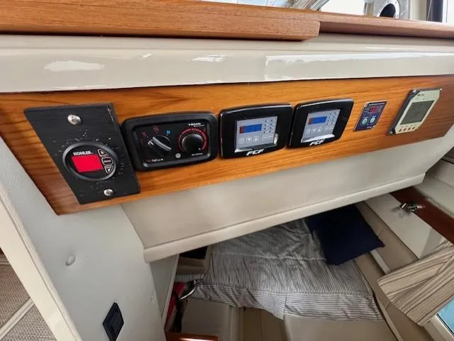 Seahorse Yacht Photos Pics Control panel of 2019 Ranger Tugs R-41 CB with various electronic displays and switches.