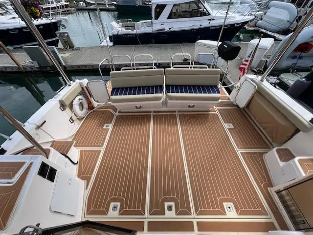 Seahorse Yacht Photos Pics 2019 Ranger Tugs R-41 CB boat deck with seating, docked at marina.
