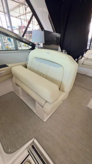  Yacht Photos Pics 2020 Regal 33 Express boat interior with beige seating and modern design.