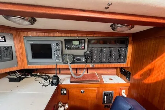 Lightwave Yacht Photos Pics Navigation and control panel inside a 1994 J Boats J 44 yacht.