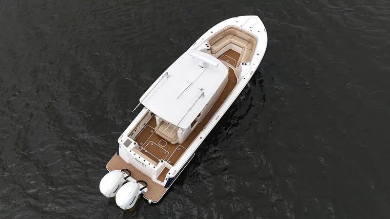 Engine Warranty X Trailer Yacht Photos Pics Aerial view of 2022 Scout 330 LXF boat on water, featuring dual engines.