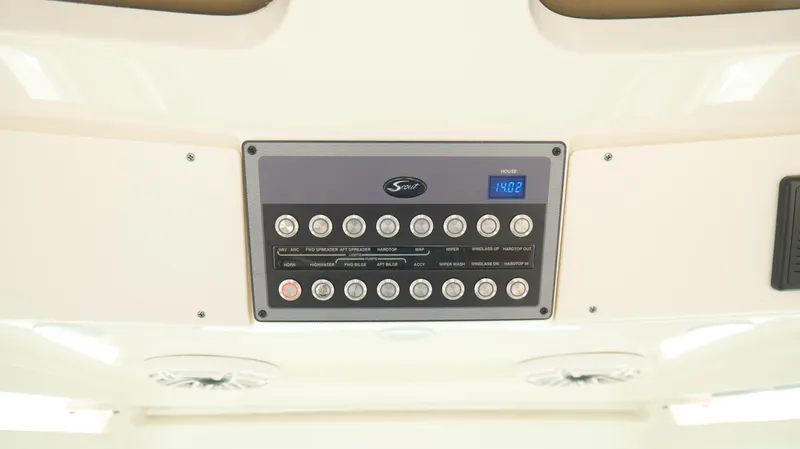 Engine Warranty X Trailer Yacht Photos Pics Control panel of 2022 Scout 330 LXF boat with various switches and digital display.