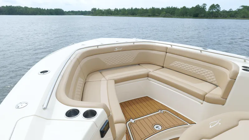 Engine Warranty X Trailer Yacht Photos Pics Luxurious seating on 2022 Scout 330 LXF boat with scenic water view.