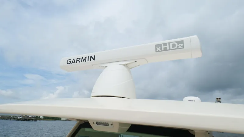 Engine Warranty X Trailer Yacht Photos Pics Garmin xHD2 radar on 2022 Scout 330 LXF boat under cloudy sky.