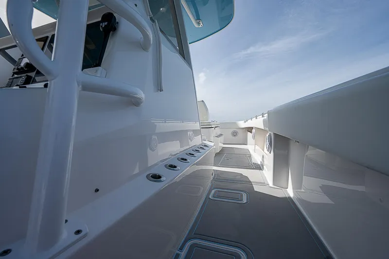 Fifty/50 Yacht Photos Pics 2019 Invincible 37 Catamaran deck view with sleek design and spacious layout.