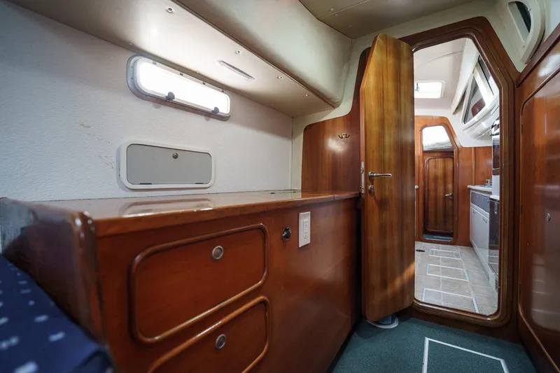 Solitude Yacht Photos Pics Interior of 1995 Prout 45 yacht, featuring wooden cabinetry and modern design elements.