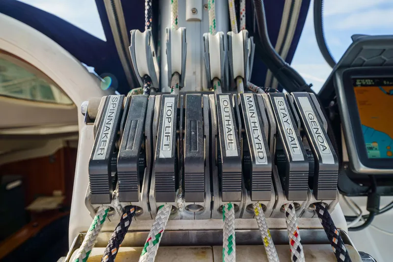 Solitude Yacht Photos Pics Sailing controls on a 1995 Prout 45 catamaran, featuring labeled rope clutches.