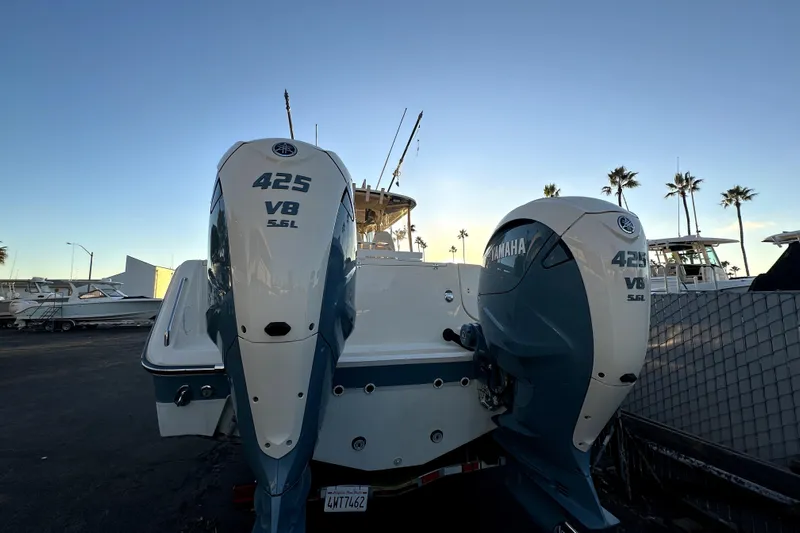 Killer B Yacht Photos Pics 2019 Grady-White Canyon 336 with twin Yamaha 425 V8 engines at sunset.
