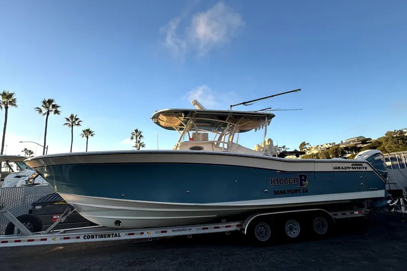 Killer B Yacht Photos Pics 2019 Grady-White Canyon 336 boat on trailer, Dana Point, CA, palm trees in background.