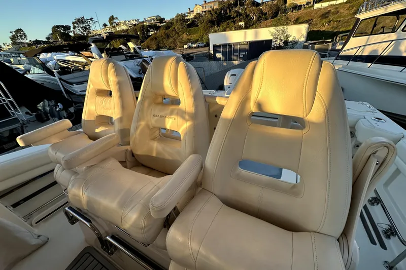Killer B Yacht Photos Pics 2019 Grady-White Canyon 336 boat seats in marina setting, showcasing luxury and comfort.