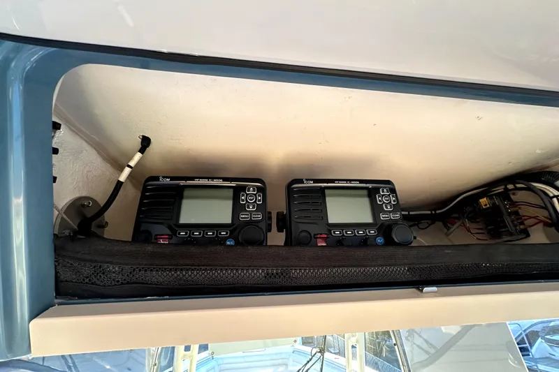 Killer B Yacht Photos Pics 2019 Grady-White Canyon 336 boat electronics, featuring dual Icom VHF radios.