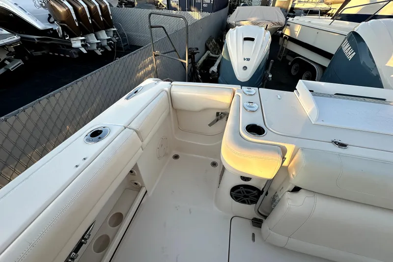 Killer B Yacht Photos Pics 2019 Grady-White Canyon 336 boat interior with seating and Yamaha V8 engine.