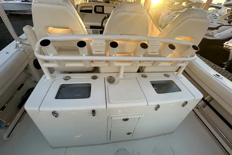 Killer B Yacht Photos Pics 2019 Grady-White Canyon 336 boat interior with rod holders and storage compartments.