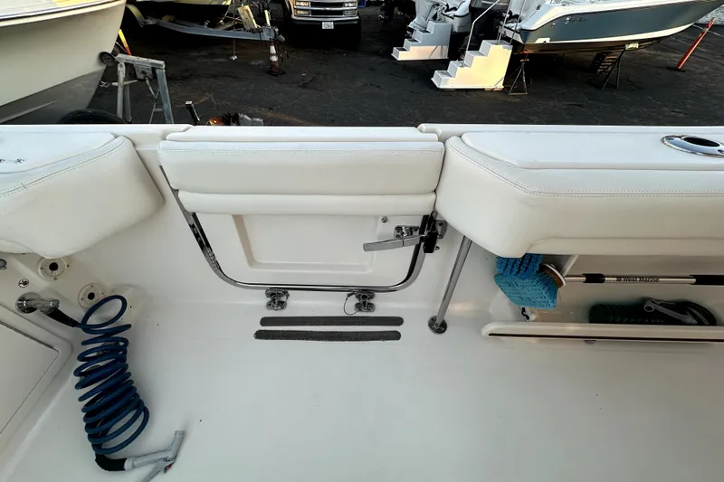 Killer B Yacht Photos Pics 2019 Grady-White Canyon 336 boat interior with seating and storage features.