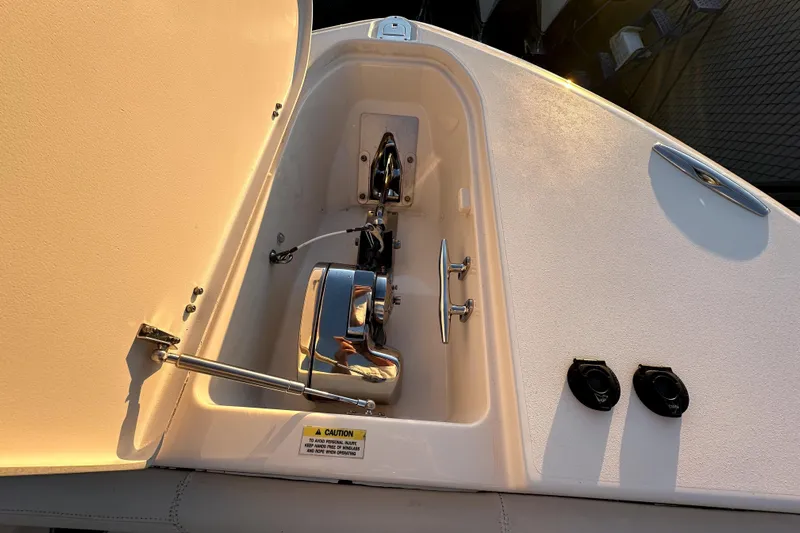 Killer B Yacht Photos Pics Anchor compartment of 2019 Grady-White Canyon 336 boat, featuring polished metal components.