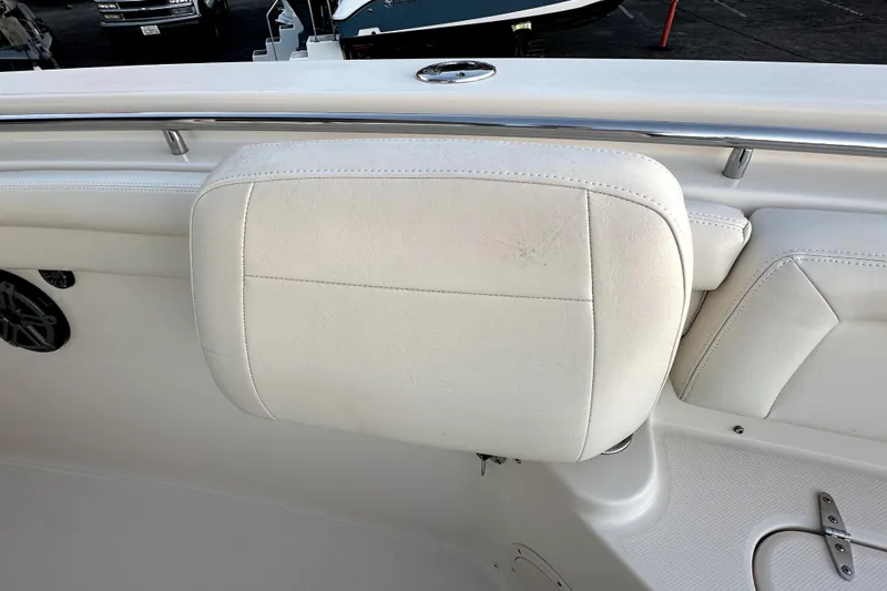 Killer B Yacht Photos Pics 2019 Grady-White Canyon 336 boat interior with white cushioned seating.