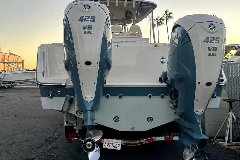 Killer B Yacht Photos Pics 2019 Grady-White Canyon 336 boat with twin Yamaha 425 V8 engines at sunset.