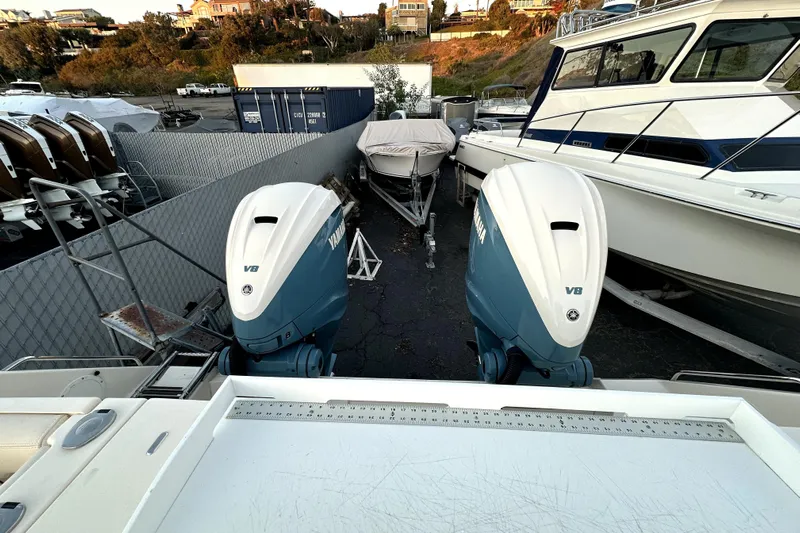 Killer B Yacht Photos Pics 2019 Grady-White Canyon 336 with twin Yamaha V8 engines in a boatyard.