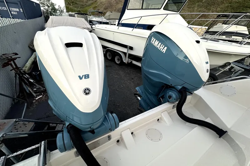 Killer B Yacht Photos Pics 2019 Grady-White Canyon 336 with twin Yamaha V8 outboard engines in a boatyard.